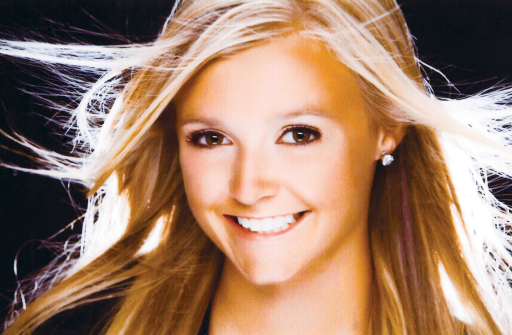 Photo of a young woman with excellent teeth